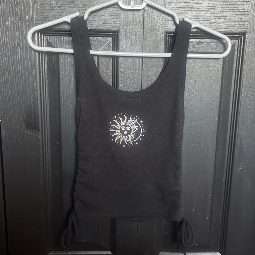 Slightly cropped tank top with adjustable sides
